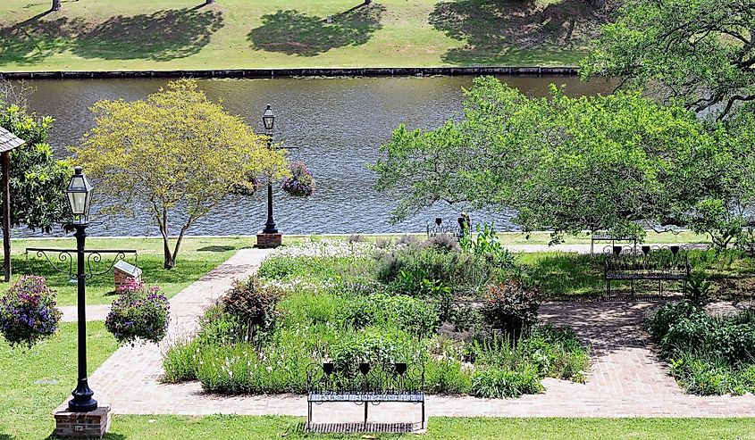 The colorful downtown park of historic Natchitoches, Louisiana, sits by the Cane River Lake.