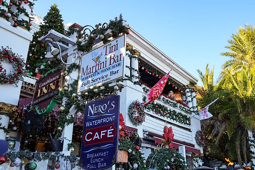 St. Augustine, Florida: SIgns for Tini Martini Bar, Nero's Waterfront Cafe and the Casablanca Inn, decorated for the Christmas holiday