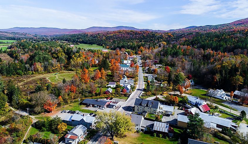 East Burke, Vermont with fall colors and mountains in the background