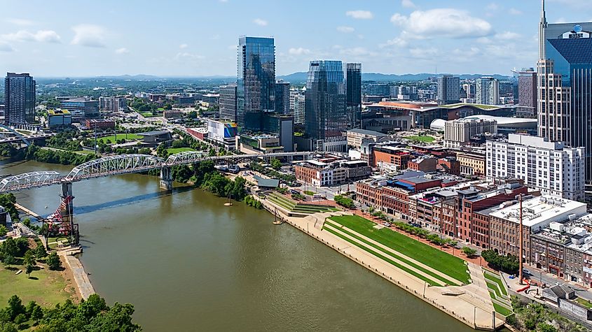 Aerial view of John Seigenthaler Pedestrian Bridge and cityscape.