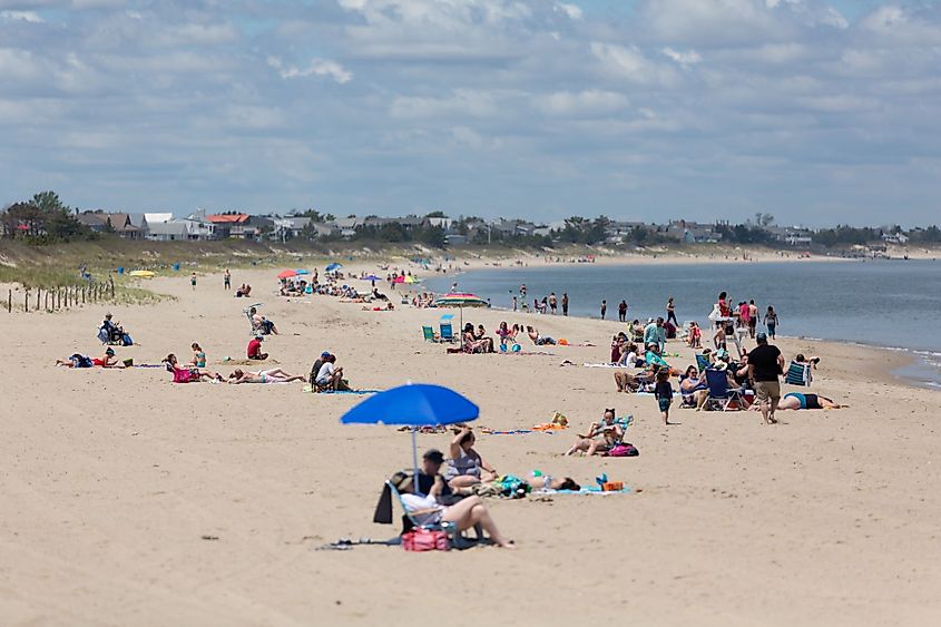 The beach goers on the Lewes Beach in Lewes, Delaware