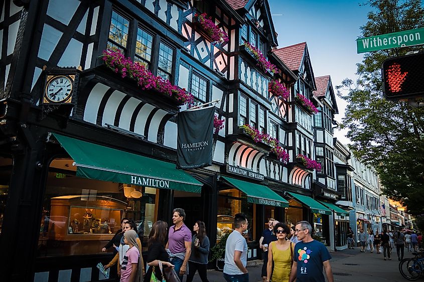 Shoppers and pedestrians near a Tudor style building on Witherspoon Street in Princeton, New Jersey, via Benjamin Clapp / Shutterstock.com