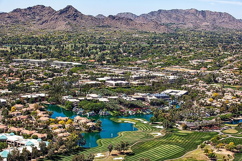 Scottsdale, Arizona: Aerial view looking southwest at golf courses, resorts, luxury homes, and Mummy Mountain.