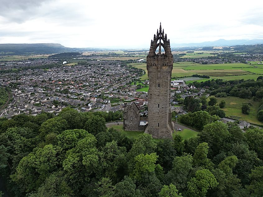 An aerial shot of the historic National Wallace Monument in Stirling, Scotland