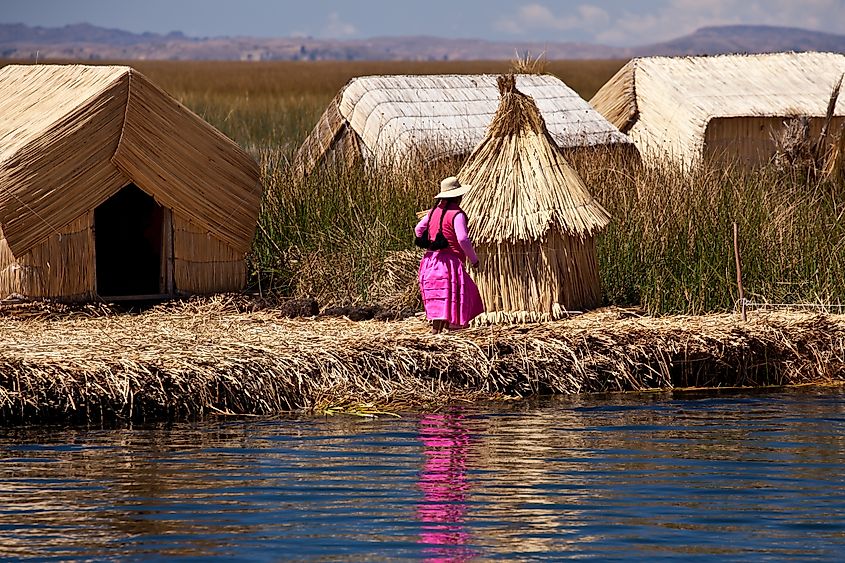 Exploring Uros: The Enchanting Floating Village of Lake Titicaca, Peru. Credit: SATRIA NANGISAN/Shutterstock.com