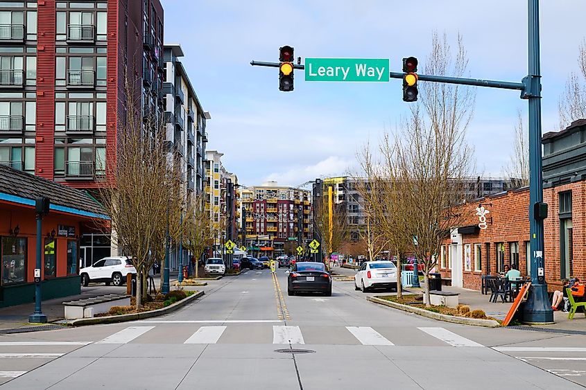 View along Cleveland Street from Leary Way in downtown Redmond with roadsign and traffic light on yellow, via Ian Dewar / Shutterstock.com
