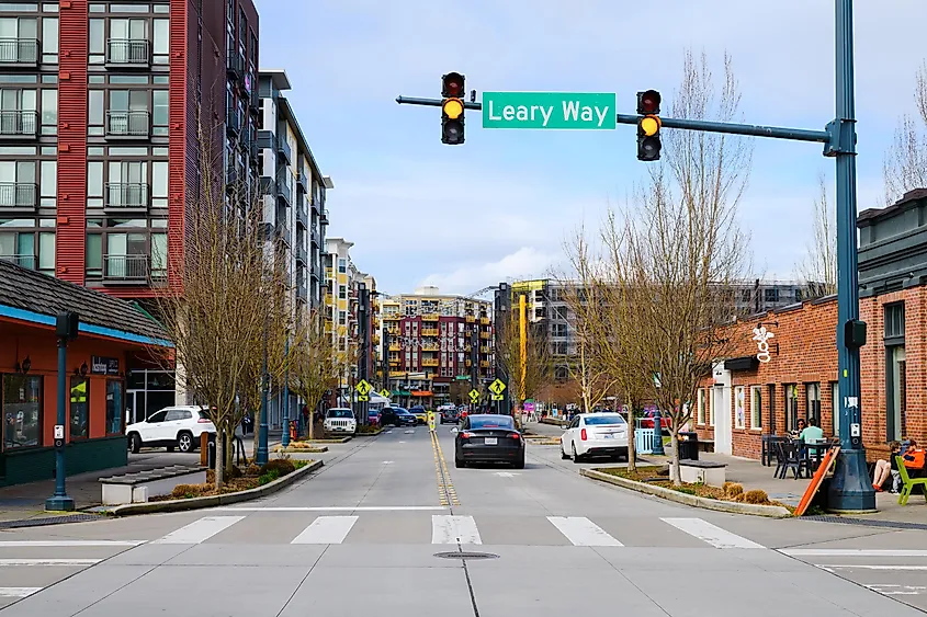 View along Cleveland Street from Leary Way in downtown Redmond with roadsign and traffic light on yellow, via Ian Dewar / Shutterstock.com