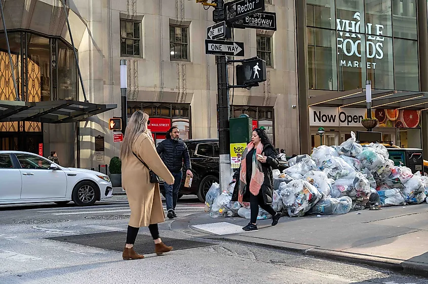 Trash bags piled up on a Manhattan street corner.