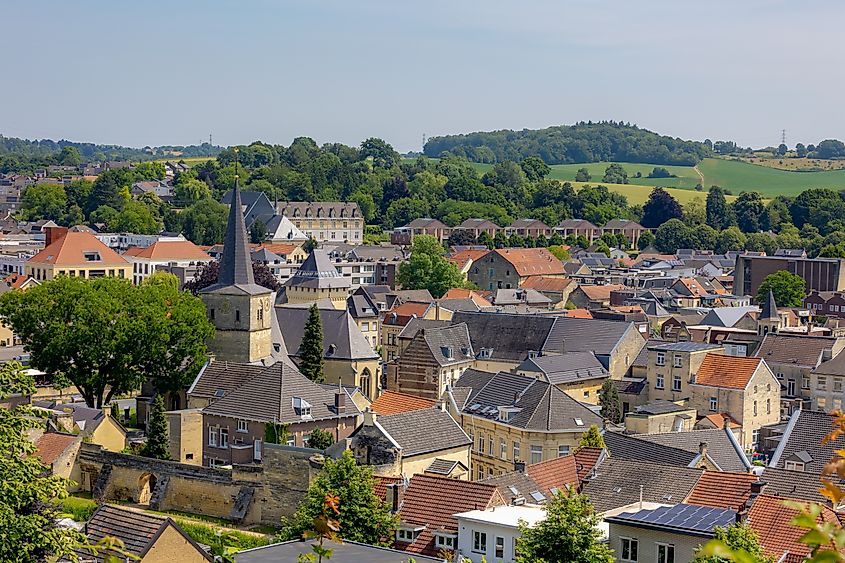 Overview of Valkenburg, a hillside town in the South Limburg hills, with mountains and surrounding farmland in the Netherlands.