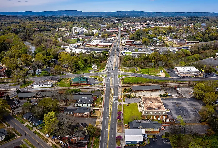 Aerial view of the city of Rome, Georgia with the mountains in the background.