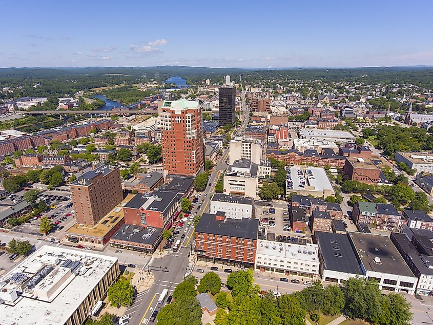 Manchester downtown building including City Hall Plaza and Brady Sullivan Plaza with Merrimack River at the background.