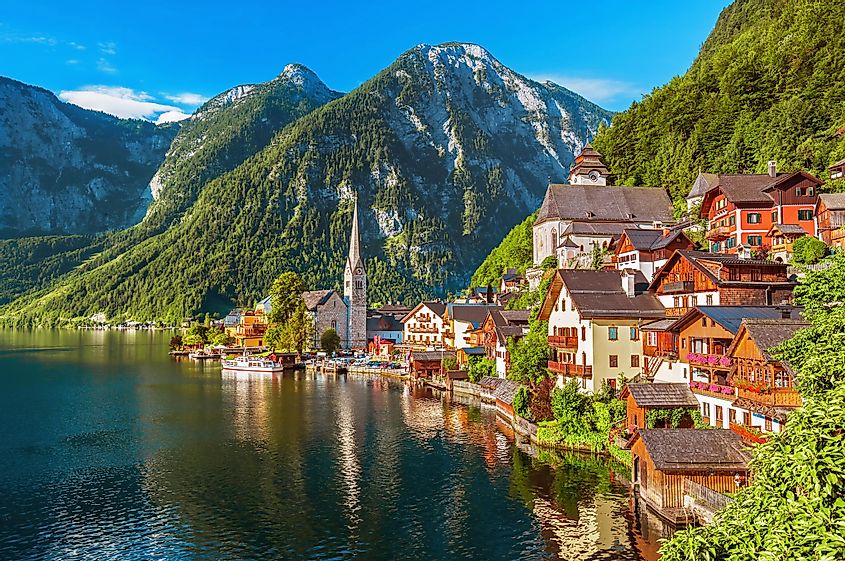 Scenic picture-postcard view of famous Hallstatt mountain village in the Austrian Alps