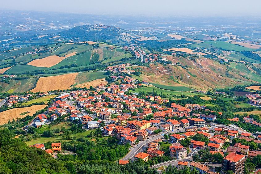 San Marino cityscape. View on San Marino city from observation deck. Yellow roofs of Scan Marino town