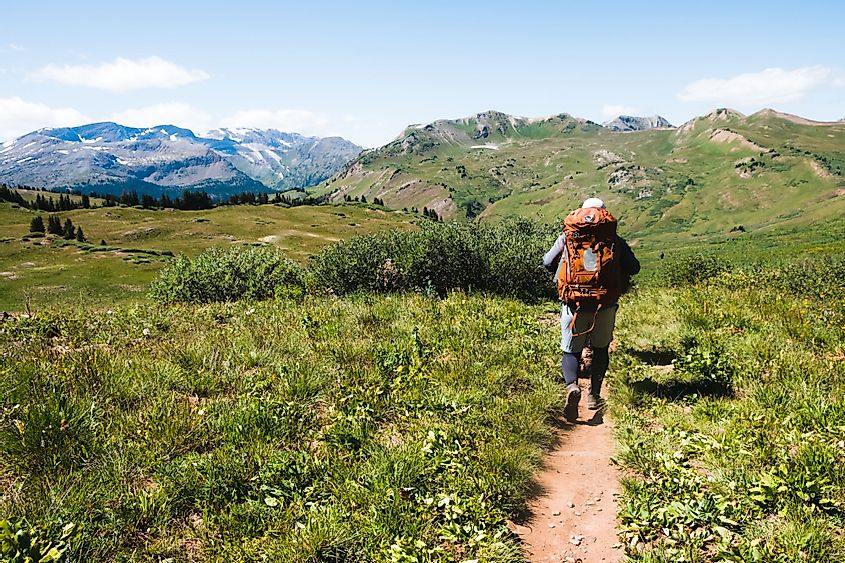 Experienced backpackers hike their way around the Maroon Bells, Colorado
