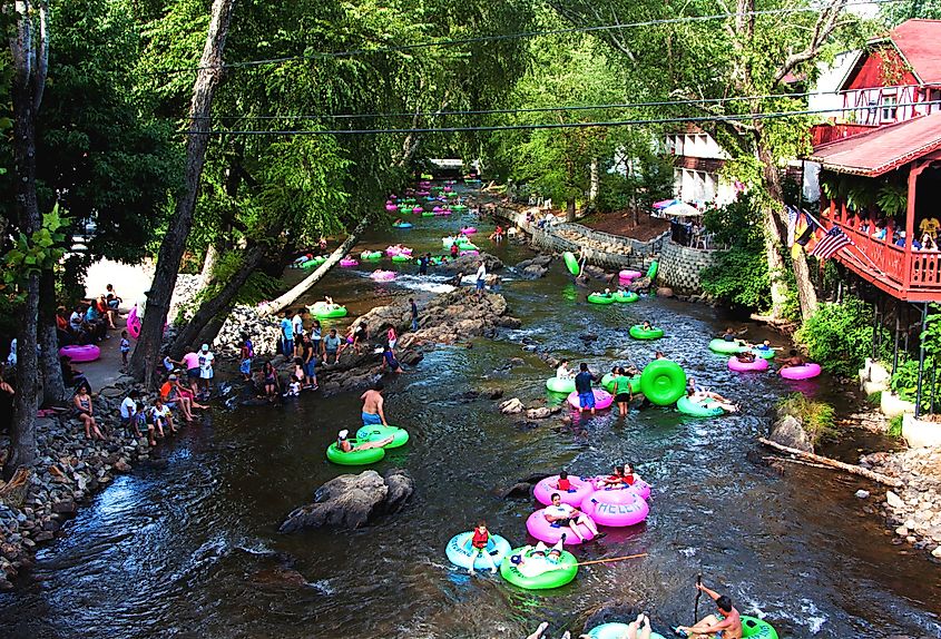 Tourists tubing the lazy river Chattahoochee in the summer in Helen, Georgia