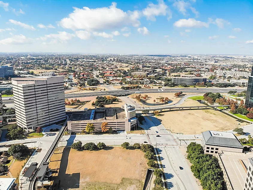 Aerial view of downtown Las Colinas, Irving, Texas, and light rail system.