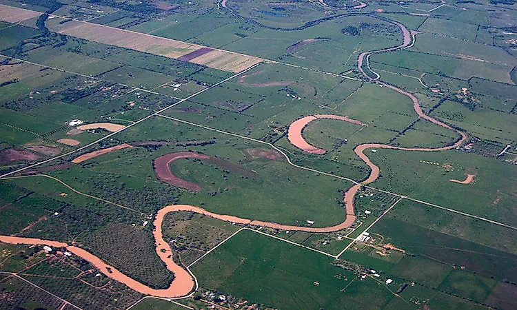 An aerial view showing oxbow lakes cut off from the main river channel