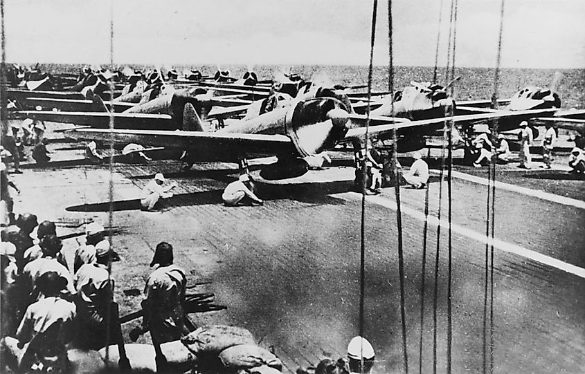 Japanese fighter and dive bomber aircraft on Shōkaku prepare to launch for an attack on U.S. carrier forces