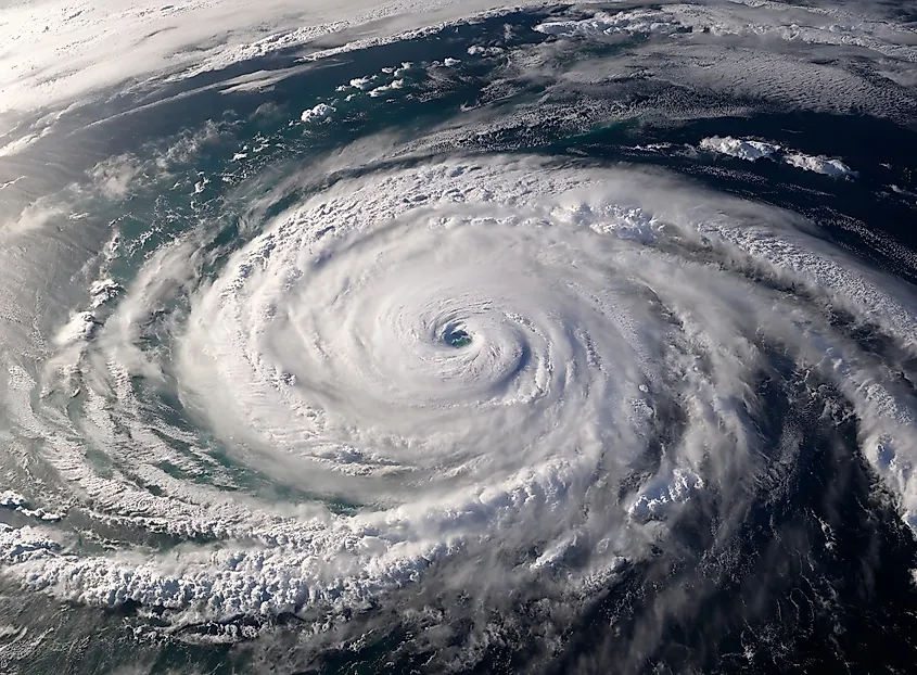 Aerial view of a tropical superstorm with a hurricane eye forming over the ocean