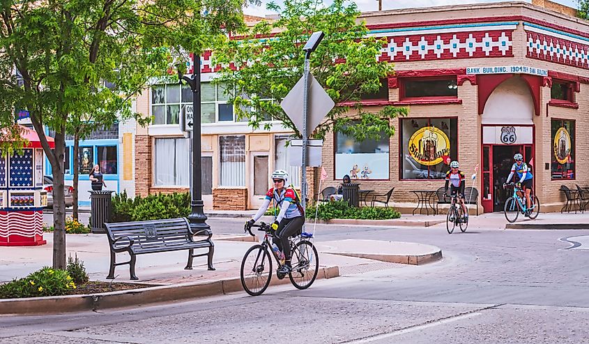 Cyclist traveling along route 66 in Winslow, Arizona