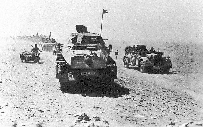 Afrika Korps tank hunters with an Sd.Kfz. 232 armoured car in front.