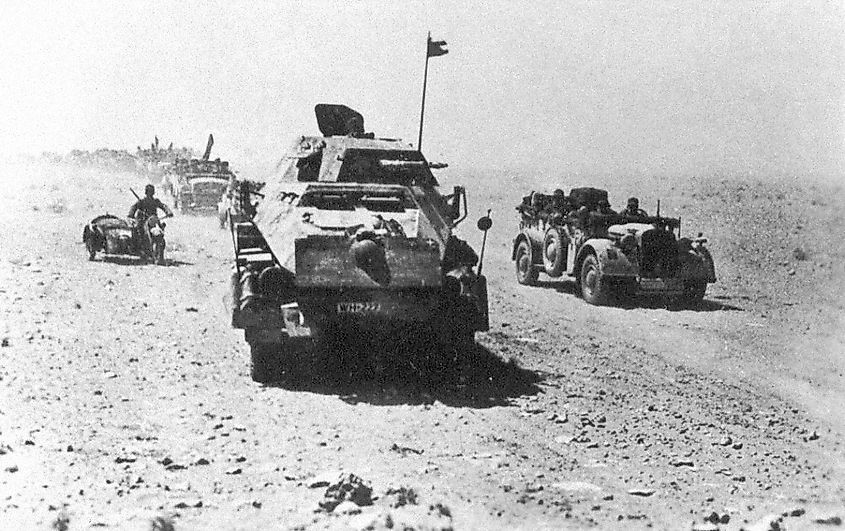 Afrika Korps tank hunters with an Sd.Kfz. 232 armoured car in front.