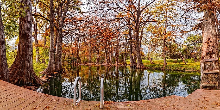 Panorama of Fall scene at Blue Hole Regional Park, Wimberley, Texas