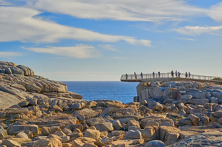  People gather at a viewpoint along the coastline of Albany, Western Australia.