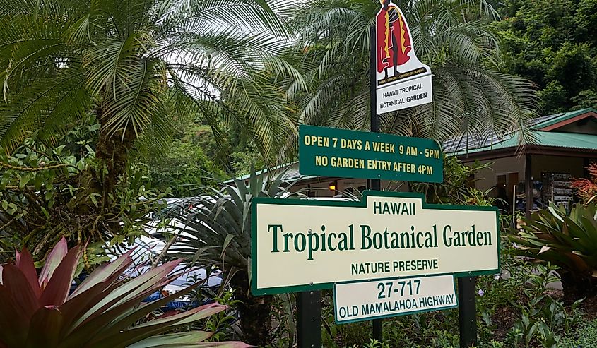 The entrance sign at Hawaii Tropical Botanical Garden, a nonprofit botanical garden and nature preserve on the Big Island of Hawai'i