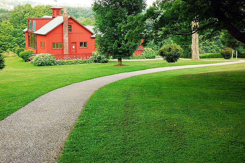 A path leads to the studio of American artist Norman Rockwell in Stockbridge, Massachusetts, via James Kirkikis / Shutterstock.com