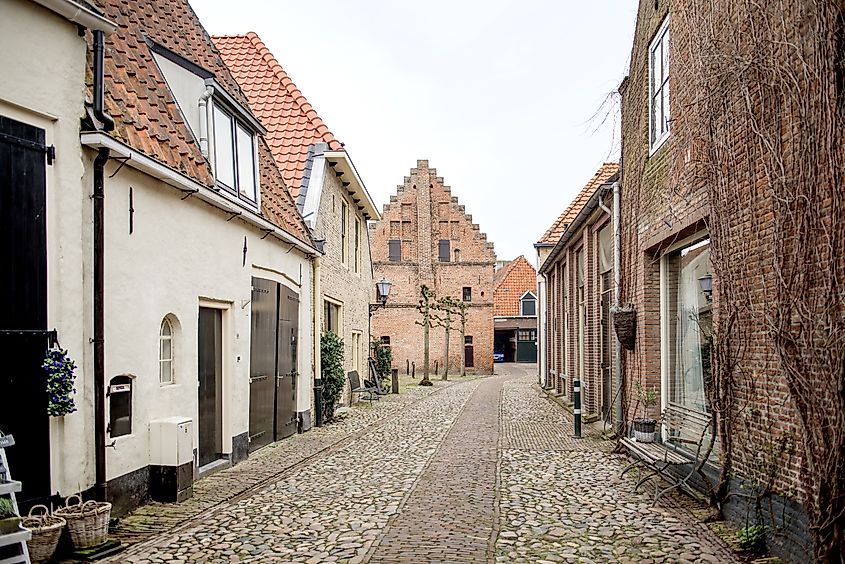 Elburg, Netherlands: Charming cobbled street in Elburg, showcasing traditional Dutch architecture and quaint houses