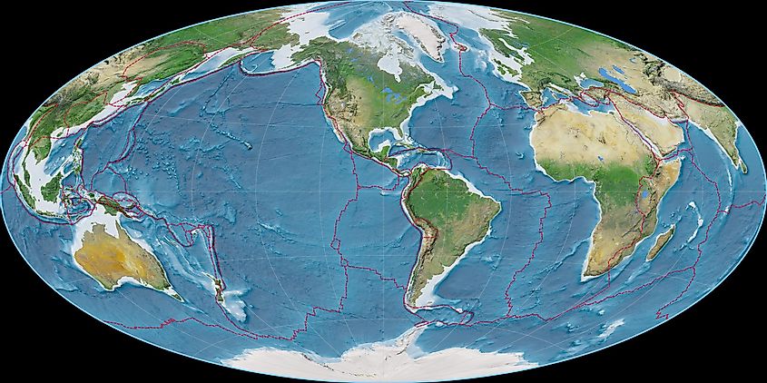 The world map with tectonic plate boundaries defined in red.
