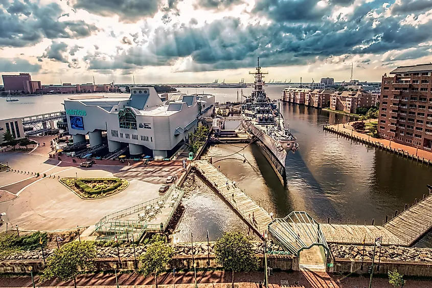 The Norfolk waterfront on the Elizabeth River with port cranes in the distance