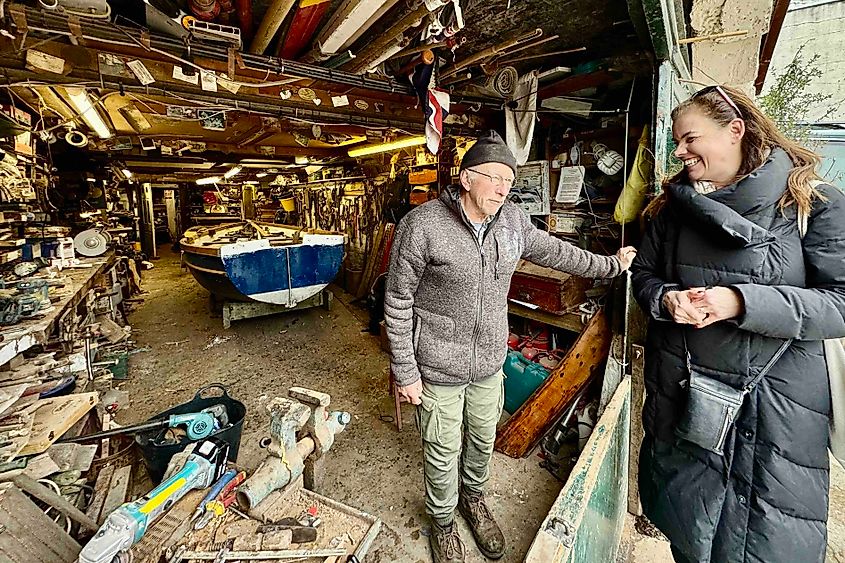 Master Boatbuilder Mark Edwards with guest at Richmond Upon Thames photo by Bryan Dearsley