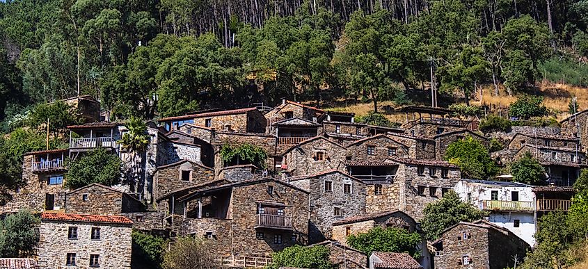 The Shale Village of Candal with its stone schist houses built high up in the mountains. Via Shutterstock / David Fadul