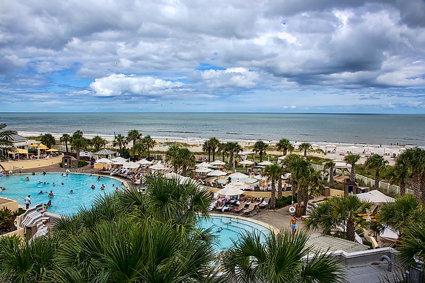 Tourists enjoying a day in the pool at a luxury resort hotel on Fernandina Beach on beautiful Amelia Island