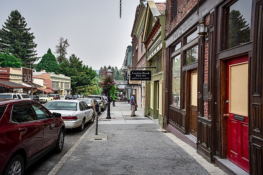  Nevada City, California: Historic old town with people outdoors.