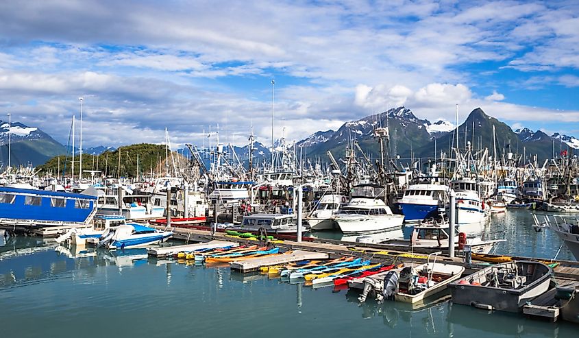 Boats and kayaks stationed in Valdez Harbor.