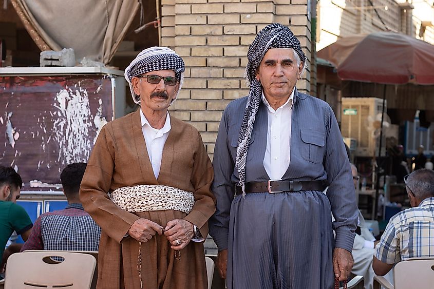 September 10, 2021 - Erbil, Iraq. Kurdish men in traditional clothes. Daily life in Erbil, Kurdistan Region. Via Shutterstock / Serhii Ivashchuk