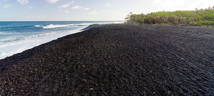 Black sands and rocks at Pohoiki Beach, Isaac Hale Park