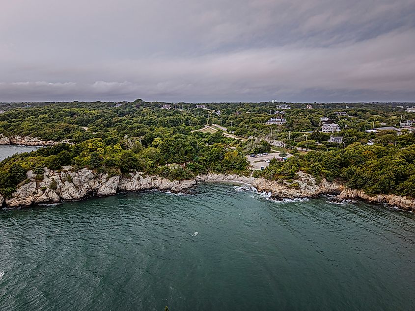 An aerial view over the rocks and rocky shores of Fort Wetherill State Park in Jamestown, Rhode Island