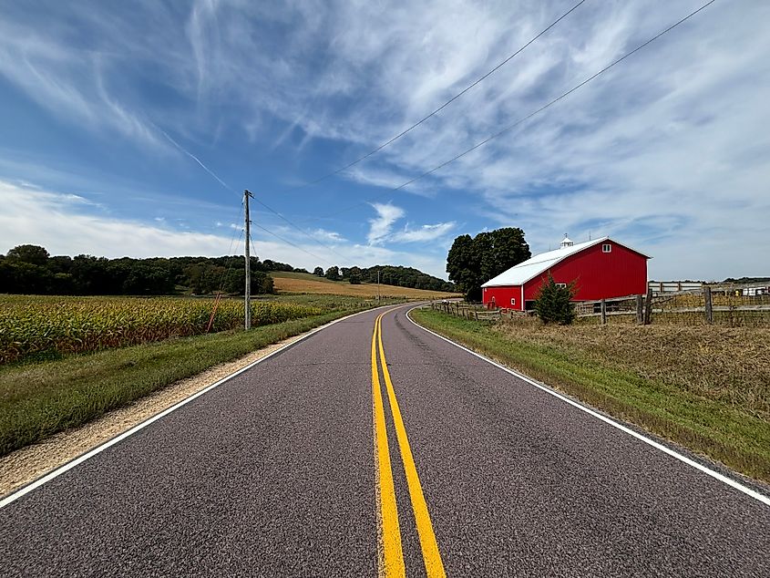 Scenic rural road through farmland in central Wisconsin.