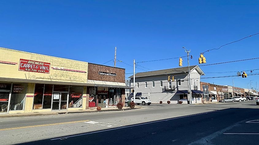 View of downtown Hohenwald, Tennessee, showcasing local storefronts and street layout.