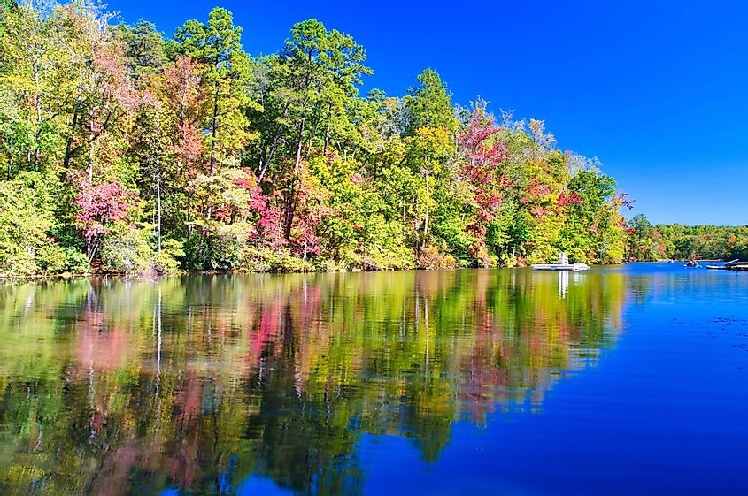 Colorful fall foliage and lake reflection, Paris Mountain State Park, South Carolina