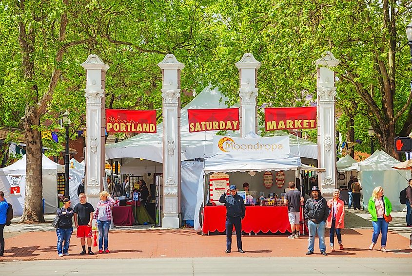 Portland Saturday Market at Governor Tom McCall Waterfront Park; It's the Rose City's largest outdoor arts and craft market, via photo.ua / Shutterstock.com