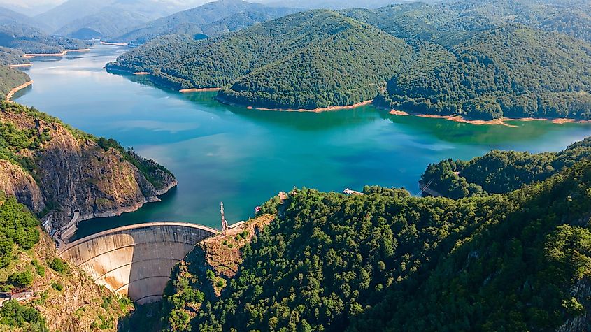 Aerial shot of the Vidraru dam along the Transfăgărășan, Romania