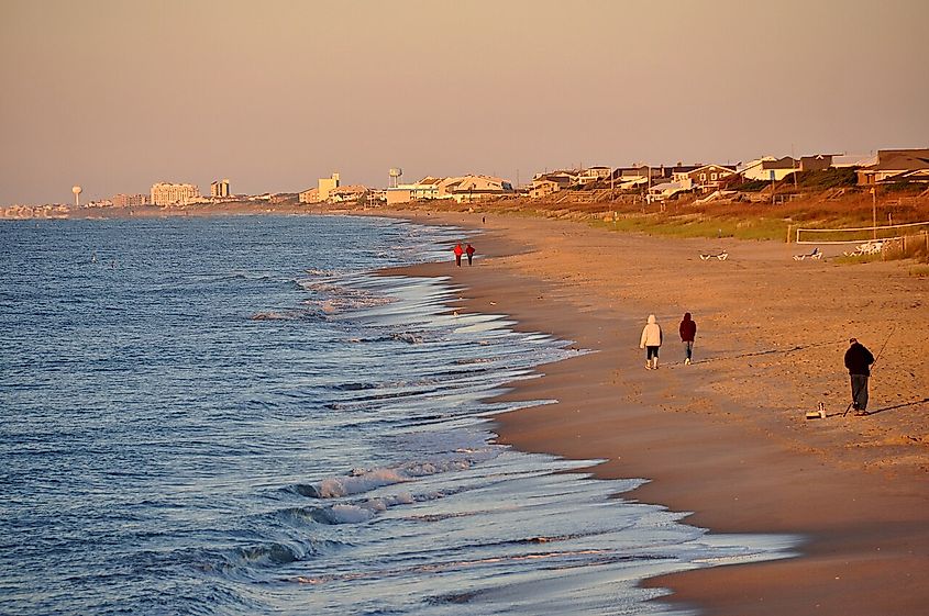 People walking on the beach at Atlantic Beach, North Carolina.