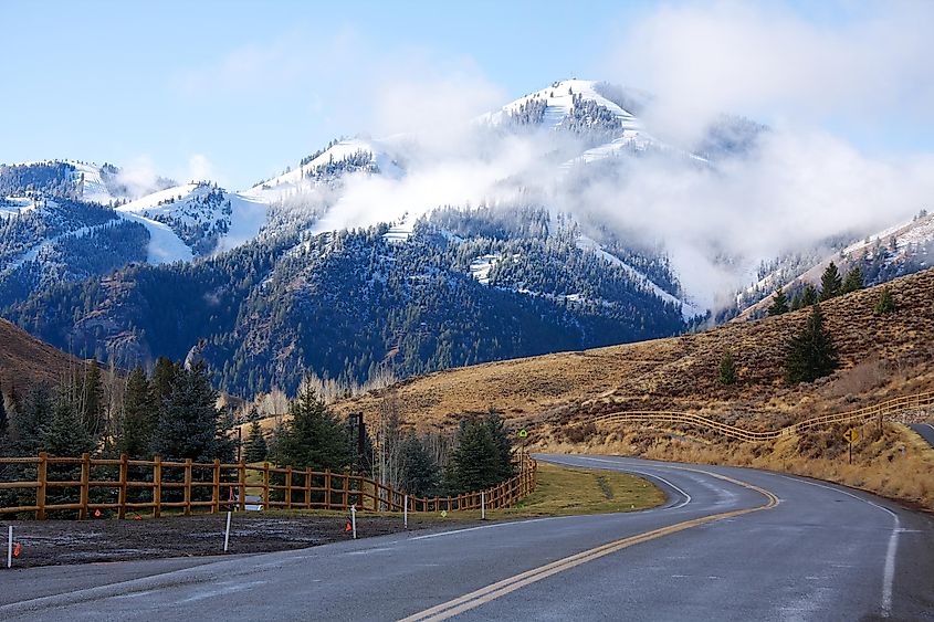 Scenic street in Sun Valley, Idaho, surrounded by mountains.