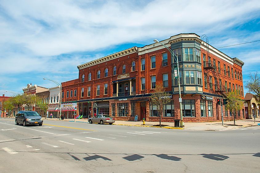 Downtown Potsdam, located in Upstate New York, boasts historic sandstone and brick commercial buildings with Italianate-style architecture along Market Street at Main Street.