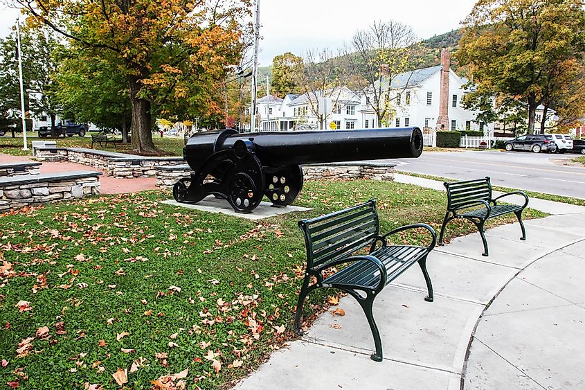 Downtown street view with historical cannon, Bristol, Vermont, USA.